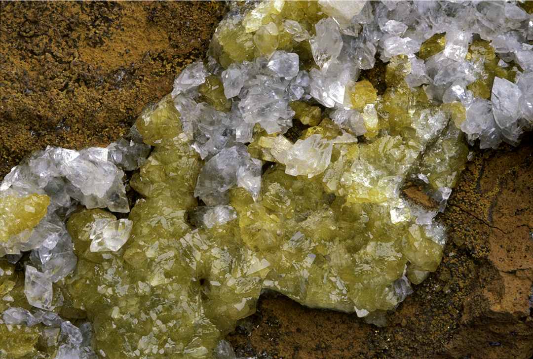 Adamite, calcite, and limonite.jpg