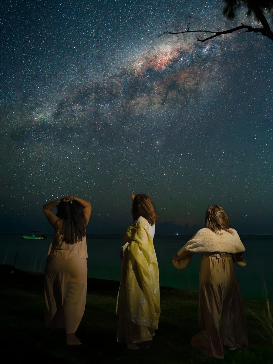 three-women-under-milky-way-night-portrait.jpg