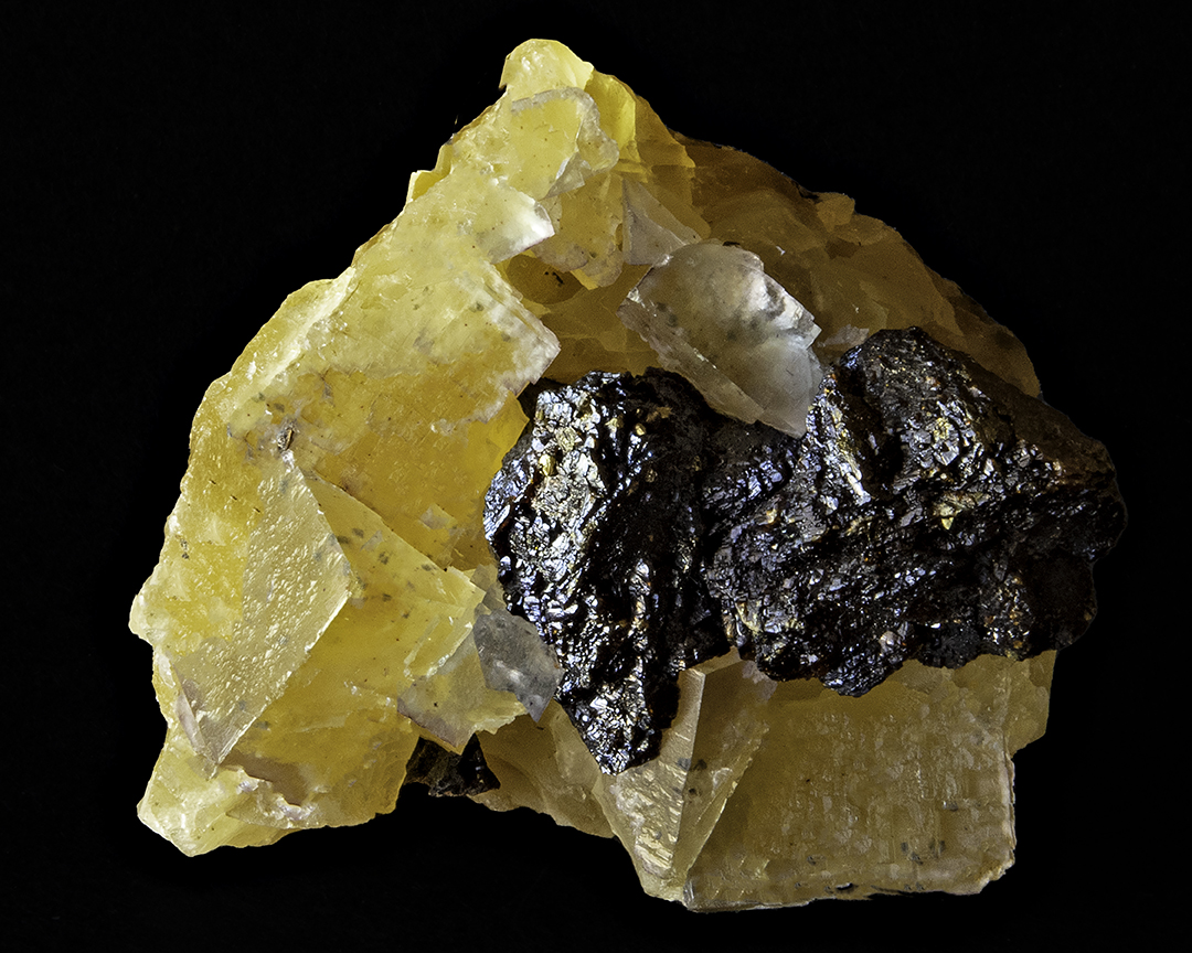 Yellow Fluorite and Sphalerite (zinc ore).jpg